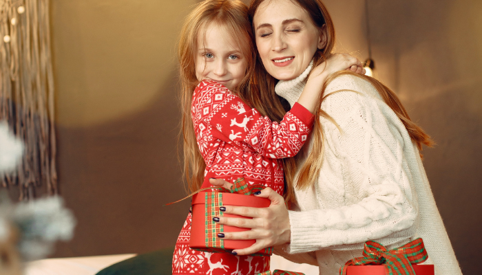 Child in Christmas pajamas