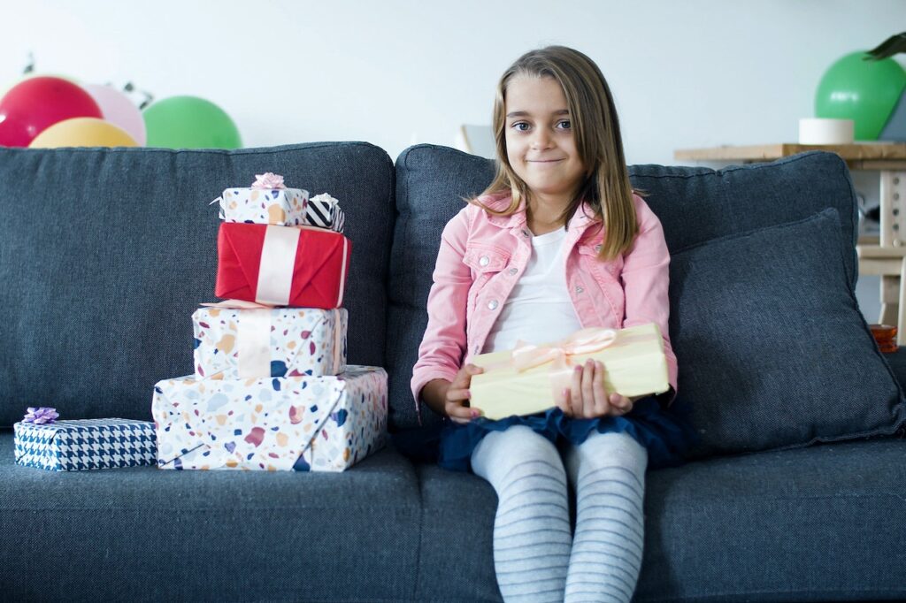 Niece with birthday gifts