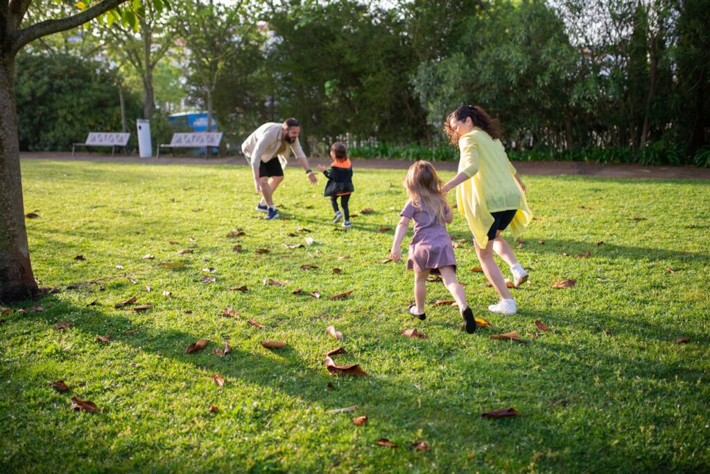 family playing outdoor games